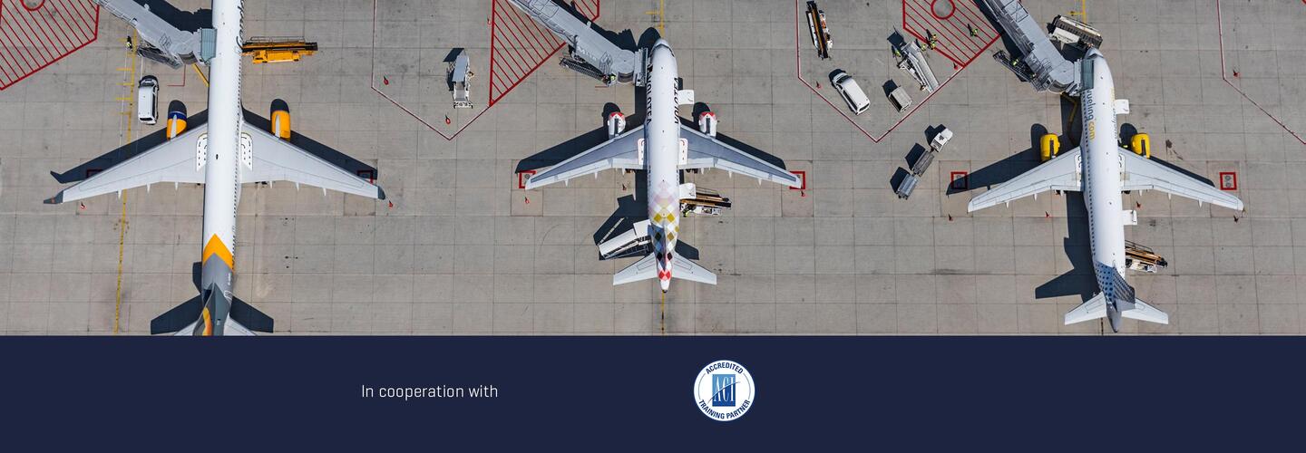 ACI Trainings 2027 Front view of a passenger aircraft on a runway representing international ACI training programs
