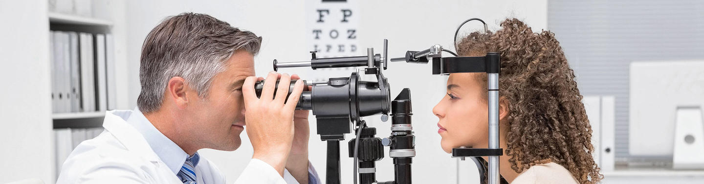 Ophthalmological Examination at Munich Airport An ophthalmologist examines a patient’s eye with a slit lamp at the eye clinic at Munich Airport; both are seen in profile, and the setting appears calm, focused, and professional.