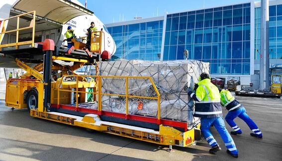 Ground handling staff loading an aircraft