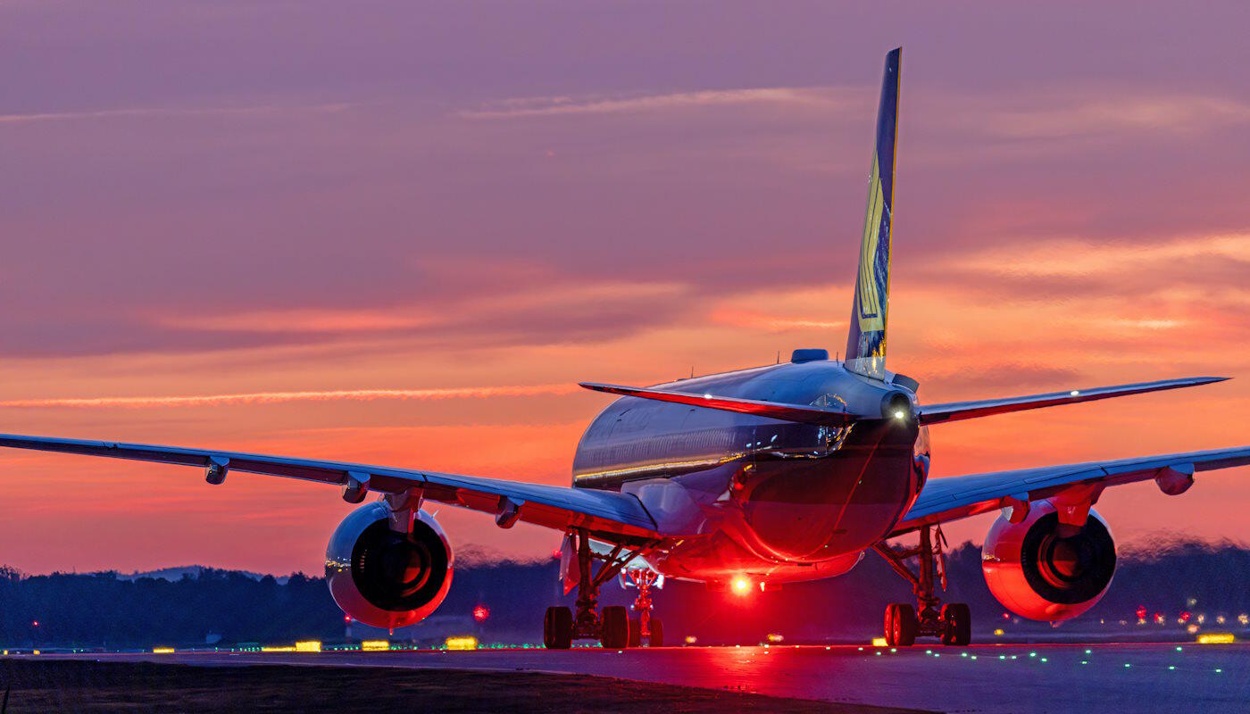 Singapore Airlines on the runway at dusk Singapore Airlines on the runway at dusk at Munich Airport