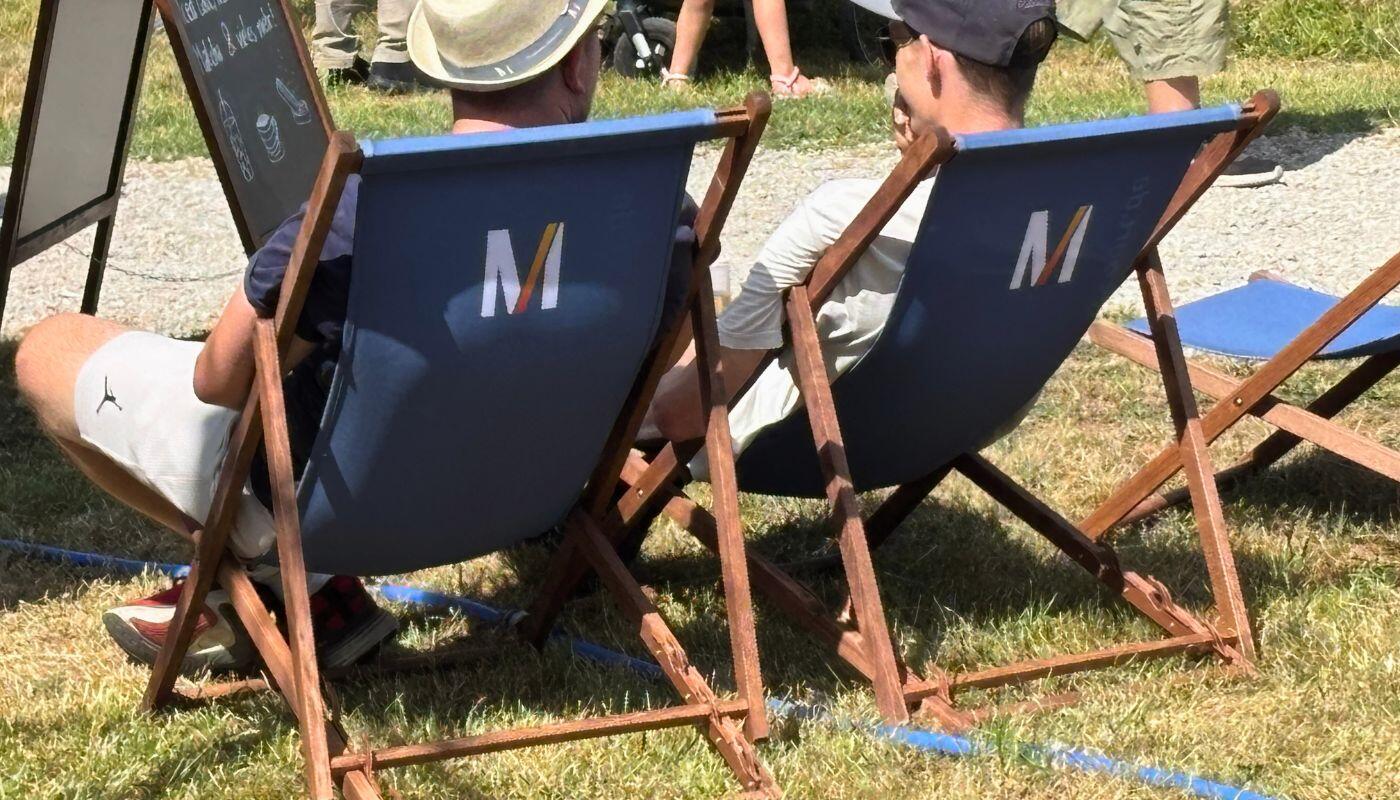 Relaxing in Glonntal Valley Two men sit back and relax in deck chairs at the Glonntal Festival.