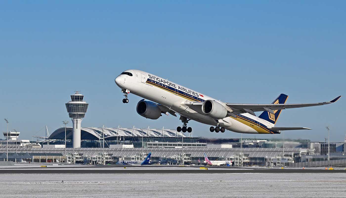 Singapore Airlines expands its presence in Munich Singapore Airlines and Lufthansa aircraft on the tarmac of an international airport with terminal building and control